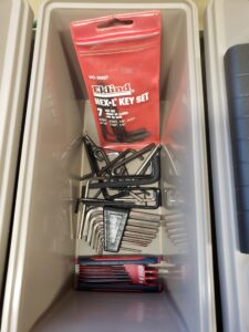 Assortment of allen wrenches  stored in a toolbox, essential tools for gunsmithing and firearm maintenance.