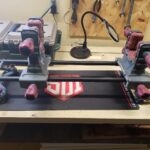 A tipton gun vise on a workbench owned by Pins and Springs Gunsmithing.